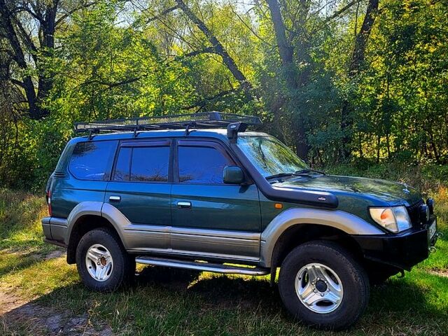 Зеленый Тойота Ленд Крузер Прадо, объемом двигателя 3.4 л и пробегом 380 тыс. км за 8700 $, фото 3 на Automoto.ua