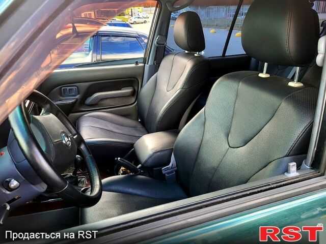 Зеленый Тойота Ленд Крузер Прадо, объемом двигателя 3.4 л и пробегом 380 тыс. км за 8700 $, фото 5 на Automoto.ua