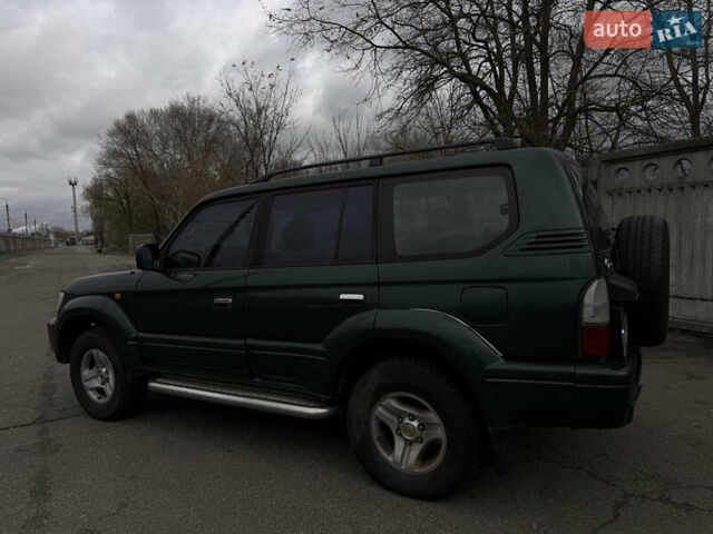 Зеленый Тойота Ленд Крузер Прадо, объемом двигателя 3.4 л и пробегом 308 тыс. км за 5999 $, фото 11 на Automoto.ua
