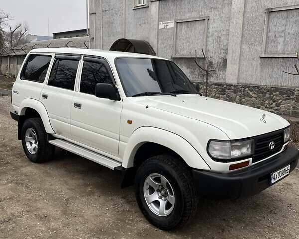 Белый Тойота Ленд Крузер, объемом двигателя 4.47 л и пробегом 321 тыс. км за 17000 $, фото 14 на Automoto.ua