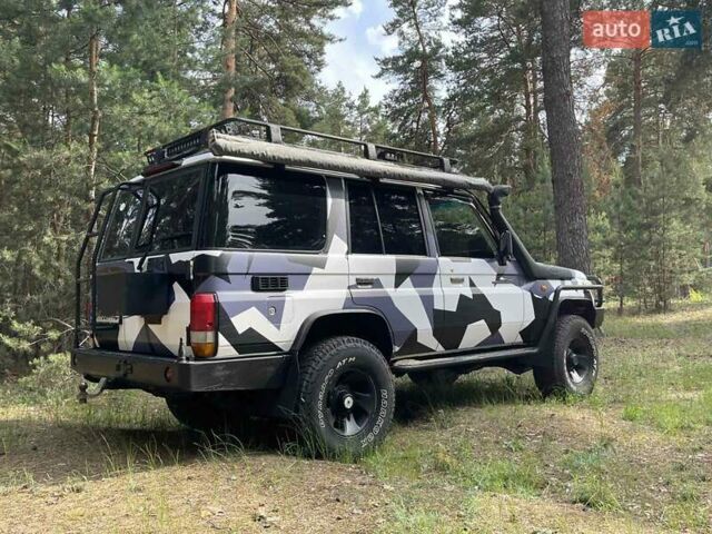 Белый Тойота Ленд Крузер, объемом двигателя 4.2 л и пробегом 137 тыс. км за 44900 $, фото 11 на Automoto.ua