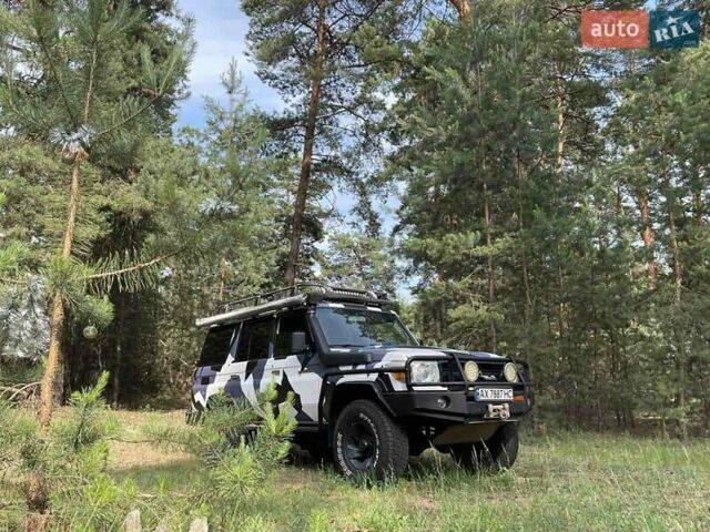 Белый Тойота Ленд Крузер, объемом двигателя 4.2 л и пробегом 137 тыс. км за 44900 $, фото 2 на Automoto.ua