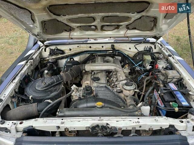 Белый Тойота Ленд Крузер, объемом двигателя 4.2 л и пробегом 137 тыс. км за 44900 $, фото 22 на Automoto.ua