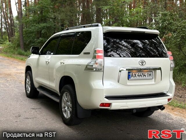 Белый Тойота Ленд Крузер, объемом двигателя 4 л и пробегом 210 тыс. км за 30000 $, фото 5 на Automoto.ua