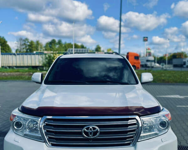 Белый Тойота Ленд Крузер, объемом двигателя 4.46 л и пробегом 302 тыс. км за 28000 $, фото 1 на Automoto.ua