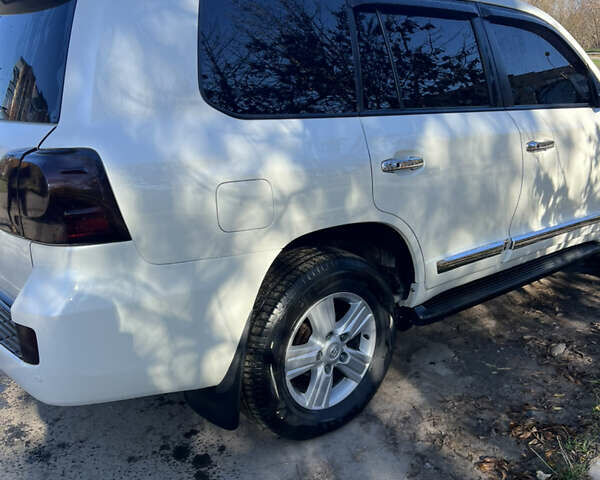 Білий Тойота Ленд Крузер, об'ємом двигуна 4.46 л та пробігом 265 тис. км за 25000 $, фото 2 на Automoto.ua