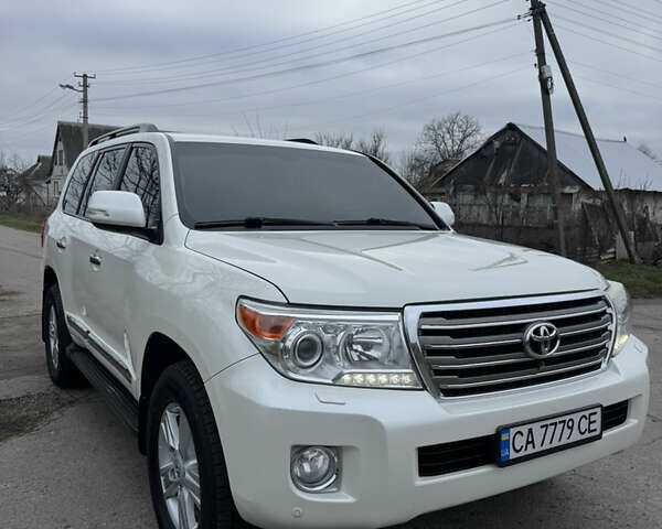 Білий Тойота Ленд Крузер, об'ємом двигуна 4.5 л та пробігом 230 тис. км за 29500 $, фото 1 на Automoto.ua