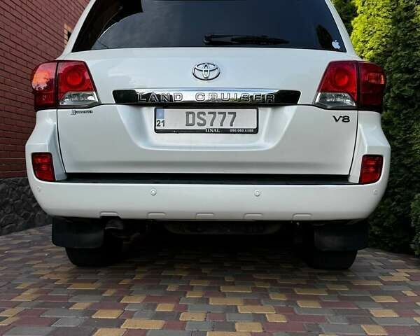 Белый Тойота Ленд Крузер, объемом двигателя 4.61 л и пробегом 147 тыс. км за 34000 $, фото 6 на Automoto.ua