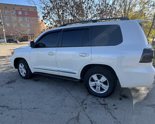 Білий Тойота Ленд Крузер, об'ємом двигуна 4.46 л та пробігом 265 тис. км за 25000 $, фото 1 на Automoto.ua