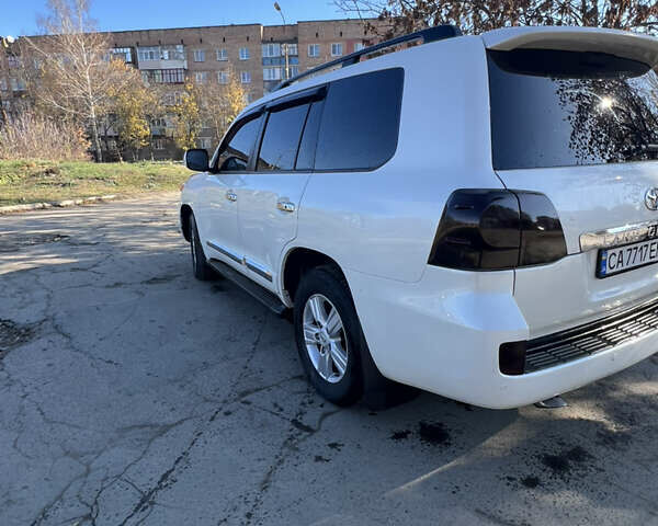 Білий Тойота Ленд Крузер, об'ємом двигуна 4.46 л та пробігом 265 тис. км за 25000 $, фото 4 на Automoto.ua