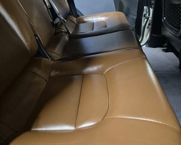 Белый Тойота Ленд Крузер, объемом двигателя 4.5 л и пробегом 184 тыс. км за 35000 $, фото 30 на Automoto.ua