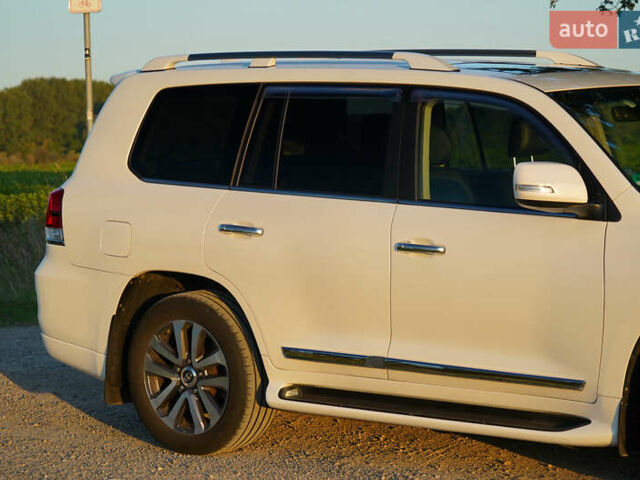 Белый Тойота Ленд Крузер, объемом двигателя 4.46 л и пробегом 215 тыс. км за 47000 $, фото 4 на Automoto.ua