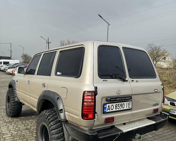 Бежевый Тойота Ленд Крузер, объемом двигателя 4.16 л и пробегом 300 тыс. км за 18900 $, фото 4 на Automoto.ua