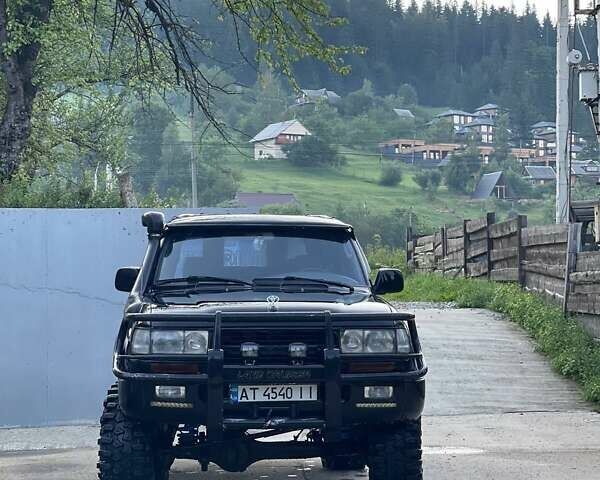 Чорний Тойота Ленд Крузер, об'ємом двигуна 4.2 л та пробігом 235 тис. км за 18950 $, фото 1 на Automoto.ua