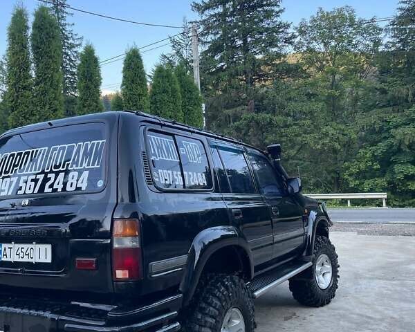 Чорний Тойота Ленд Крузер, об'ємом двигуна 4.2 л та пробігом 235 тис. км за 18950 $, фото 9 на Automoto.ua