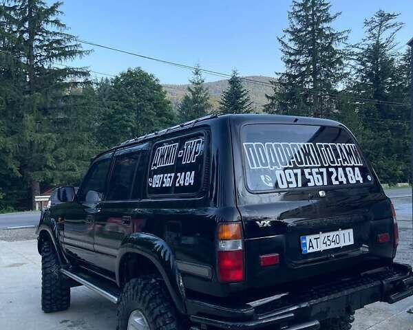 Чорний Тойота Ленд Крузер, об'ємом двигуна 4.2 л та пробігом 235 тис. км за 18950 $, фото 5 на Automoto.ua