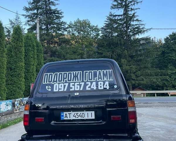 Чорний Тойота Ленд Крузер, об'ємом двигуна 4.2 л та пробігом 235 тис. км за 18950 $, фото 7 на Automoto.ua