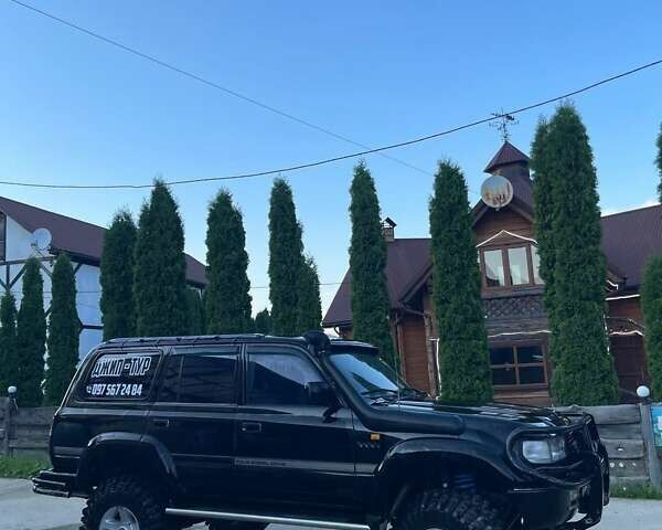 Чорний Тойота Ленд Крузер, об'ємом двигуна 4.2 л та пробігом 235 тис. км за 18950 $, фото 3 на Automoto.ua