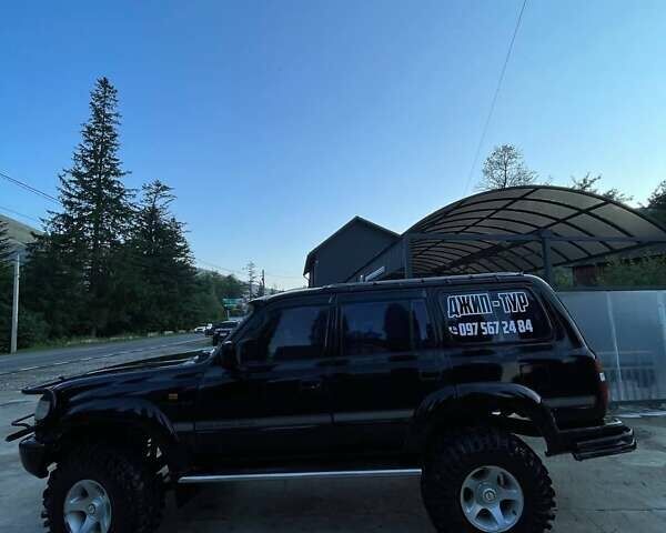 Чорний Тойота Ленд Крузер, об'ємом двигуна 4.2 л та пробігом 235 тис. км за 18950 $, фото 4 на Automoto.ua