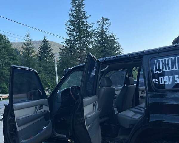 Чорний Тойота Ленд Крузер, об'ємом двигуна 4.2 л та пробігом 235 тис. км за 18950 $, фото 2 на Automoto.ua