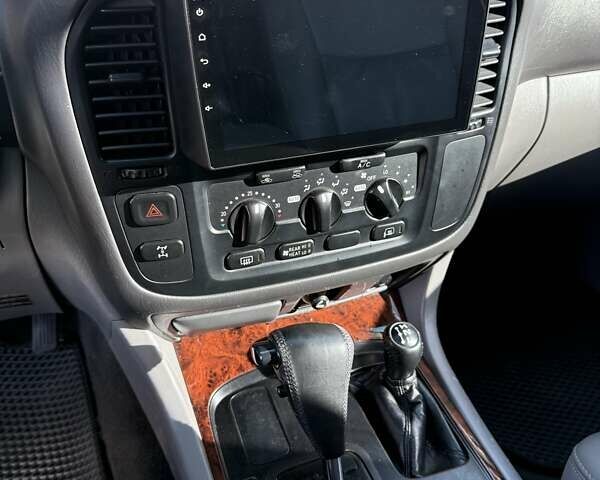 Черный Тойота Ленд Крузер, объемом двигателя 4.7 л и пробегом 470 тыс. км за 14500 $, фото 12 на Automoto.ua