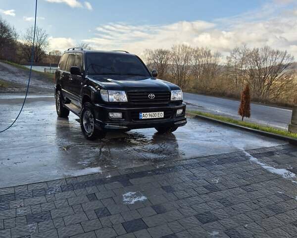 Черный Тойота Ленд Крузер, объемом двигателя 4.7 л и пробегом 287 тыс. км за 14500 $, фото 2 на Automoto.ua