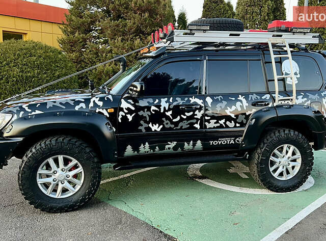 Черный Тойота Ленд Крузер, объемом двигателя 4.7 л и пробегом 430 тыс. км за 25000 $, фото 1 на Automoto.ua