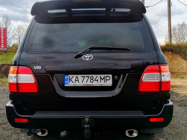 Черный Тойота Ленд Крузер, объемом двигателя 4.7 л и пробегом 493 тыс. км за 14000 $, фото 4 на Automoto.ua