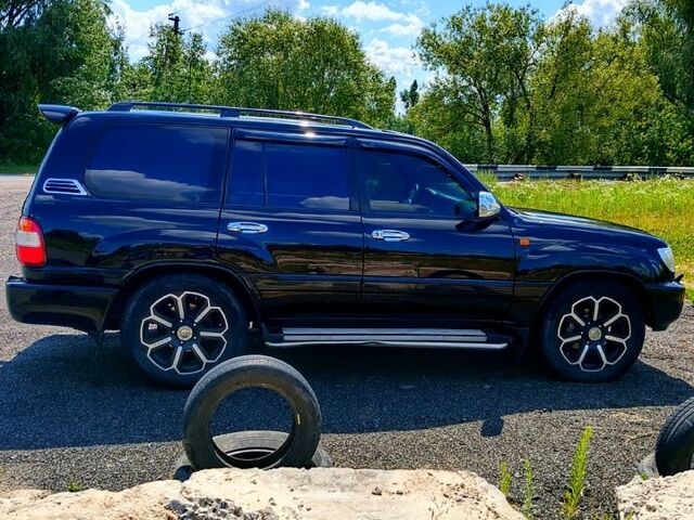 Черный Тойота Ленд Крузер, объемом двигателя 4.7 л и пробегом 493 тыс. км за 14000 $, фото 11 на Automoto.ua