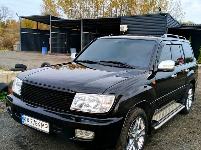 Черный Тойота Ленд Крузер, объемом двигателя 4.7 л и пробегом 493 тыс. км за 14000 $, фото 1 на Automoto.ua