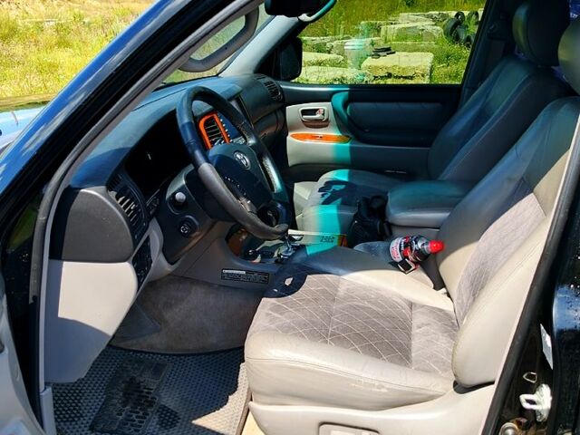 Черный Тойота Ленд Крузер, объемом двигателя 4.7 л и пробегом 493 тыс. км за 14000 $, фото 8 на Automoto.ua