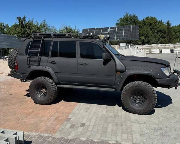 Черный Тойота Ленд Крузер, объемом двигателя 4.16 л и пробегом 242 тыс. км за 27000 $, фото 2 на Automoto.ua