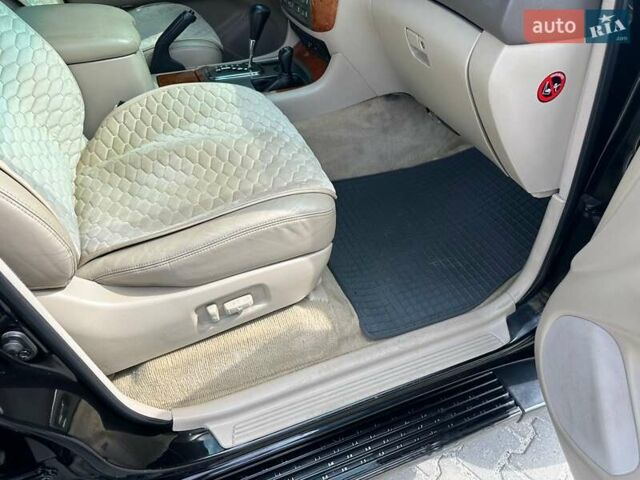 Черный Тойота Ленд Крузер, объемом двигателя 4.7 л и пробегом 286 тыс. км за 16000 $, фото 17 на Automoto.ua