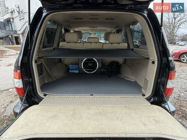 Черный Тойота Ленд Крузер, объемом двигателя 4.7 л и пробегом 298 тыс. км за 16900 $, фото 15 на Automoto.ua