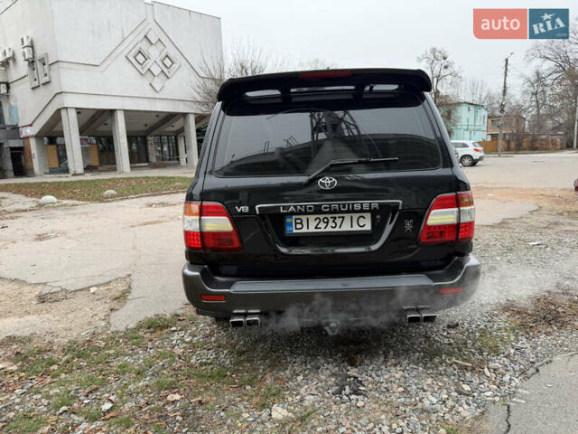Черный Тойота Ленд Крузер, объемом двигателя 4.7 л и пробегом 298 тыс. км за 16900 $, фото 4 на Automoto.ua