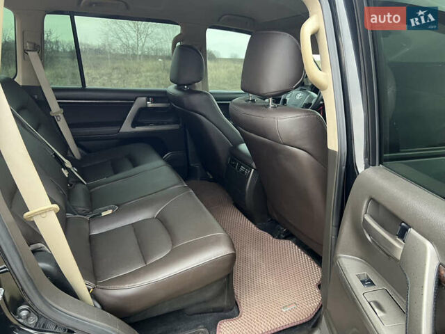 Чорний Тойота Ленд Крузер, об'ємом двигуна 4.7 л та пробігом 291 тис. км за 22800 $, фото 12 на Automoto.ua