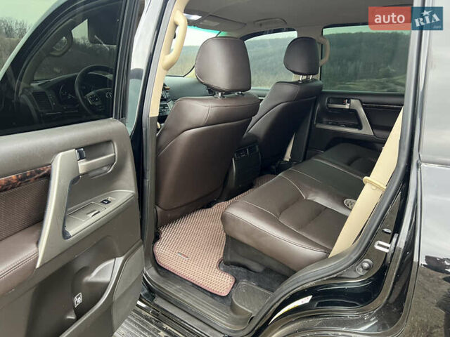 Чорний Тойота Ленд Крузер, об'ємом двигуна 4.7 л та пробігом 291 тис. км за 22800 $, фото 19 на Automoto.ua