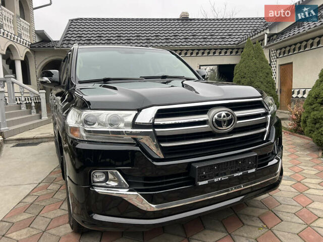 Черный Тойота Ленд Крузер, объемом двигателя 4.5 л и пробегом 297 тыс. км за 27900 $, фото 24 на Automoto.ua