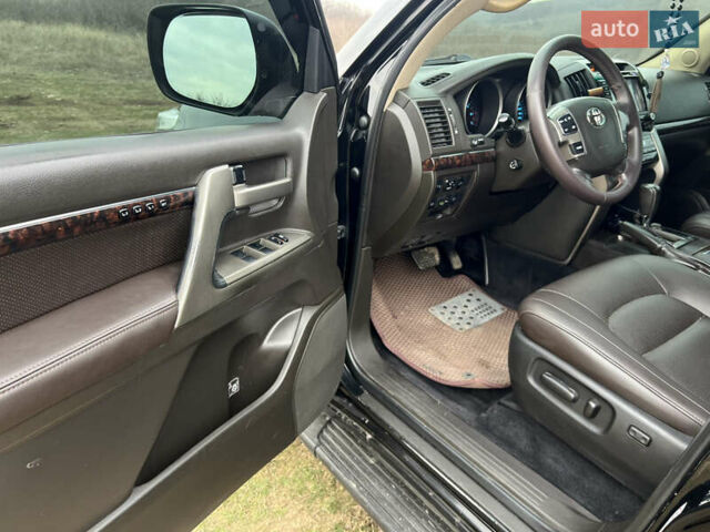 Чорний Тойота Ленд Крузер, об'ємом двигуна 4.7 л та пробігом 291 тис. км за 22800 $, фото 16 на Automoto.ua
