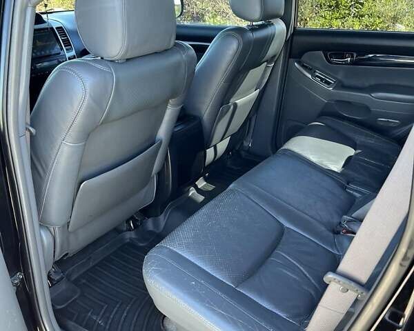 Чорний Тойота Ленд Крузер, об'ємом двигуна 4 л та пробігом 377 тис. км за 17500 $, фото 4 на Automoto.ua