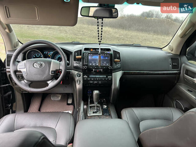 Чорний Тойота Ленд Крузер, об'ємом двигуна 4.7 л та пробігом 291 тис. км за 22800 $, фото 20 на Automoto.ua