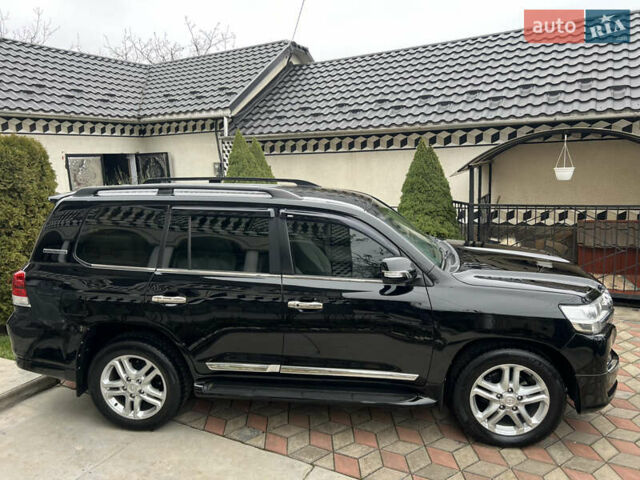 Черный Тойота Ленд Крузер, объемом двигателя 4.5 л и пробегом 297 тыс. км за 27900 $, фото 26 на Automoto.ua