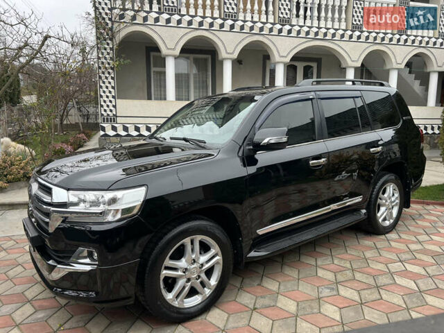 Черный Тойота Ленд Крузер, объемом двигателя 4.5 л и пробегом 297 тыс. км за 27900 $, фото 19 на Automoto.ua