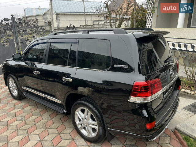 Черный Тойота Ленд Крузер, объемом двигателя 4.5 л и пробегом 297 тыс. км за 27900 $, фото 29 на Automoto.ua