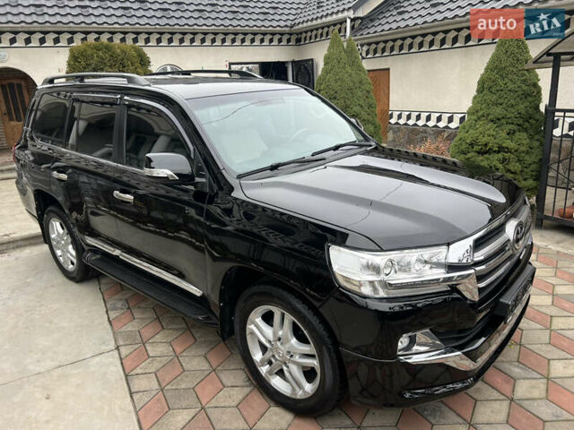 Черный Тойота Ленд Крузер, объемом двигателя 4.5 л и пробегом 297 тыс. км за 27900 $, фото 25 на Automoto.ua
