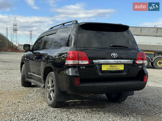 Черный Тойота Ленд Крузер, объемом двигателя 4.66 л и пробегом 329 тыс. км за 21000 $, фото 1 на Automoto.ua