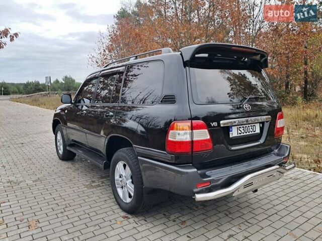 Черный Тойота Ленд Крузер, объемом двигателя 4.66 л и пробегом 337 тыс. км за 20700 $, фото 11 на Automoto.ua
