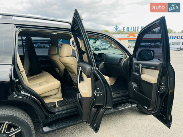 Черный Тойота Ленд Крузер, объемом двигателя 5.7 л и пробегом 239 тыс. км за 23500 $, фото 31 на Automoto.ua