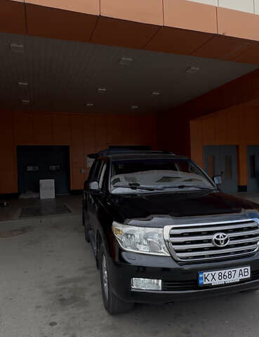 Чорний Тойота Ленд Крузер, об'ємом двигуна 5.66 л та пробігом 289 тис. км за 25000 $, фото 11 на Automoto.ua