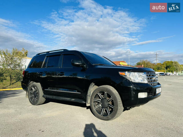 Черный Тойота Ленд Крузер, объемом двигателя 5.7 л и пробегом 239 тыс. км за 23500 $, фото 14 на Automoto.ua